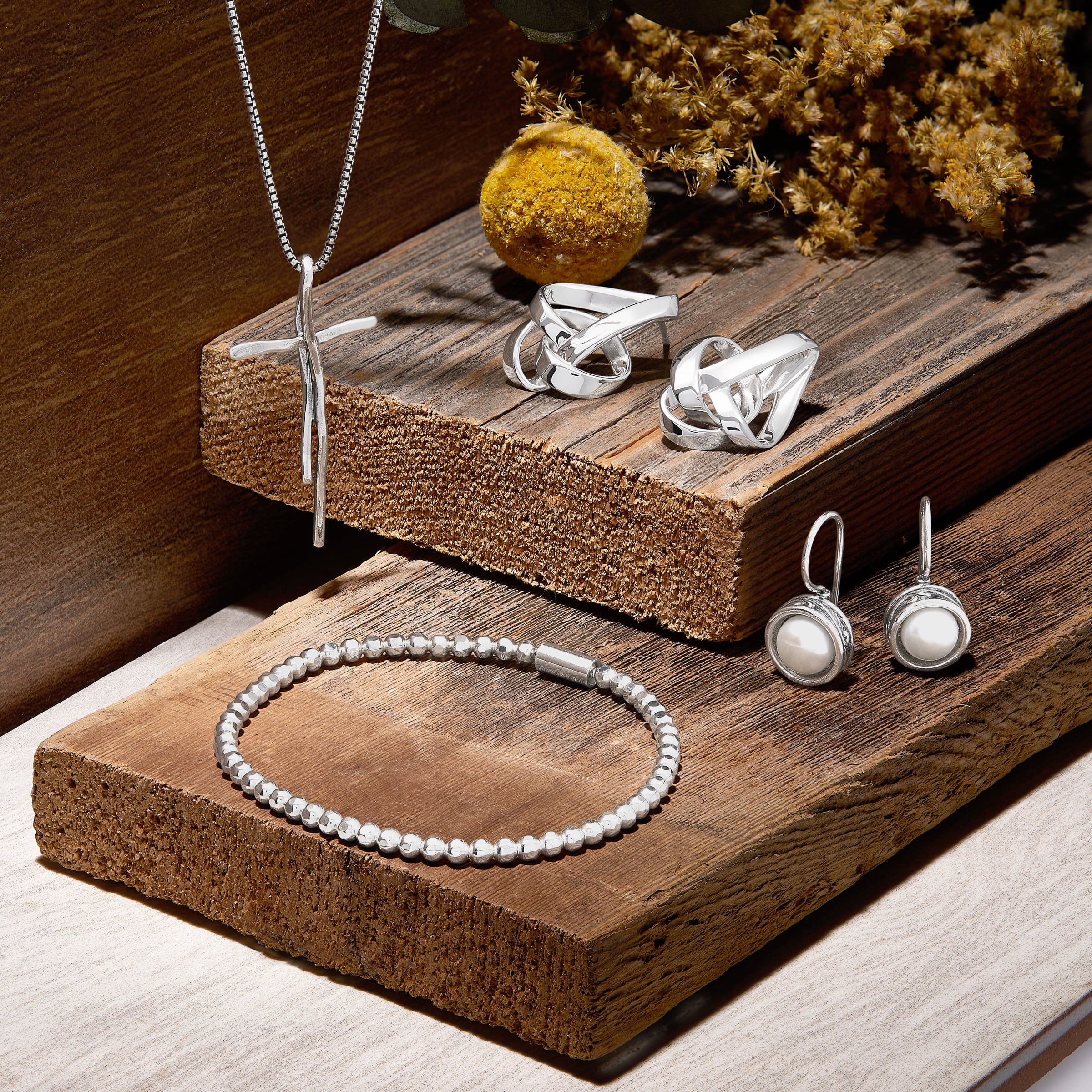Infinity Hoop Earrings in Sterling Silver