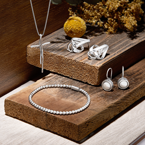 Infinity Hoop Earrings in Sterling Silver Infinity Hoop Earrings in Sterling Silver